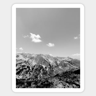 Rocky mountain peak and sky, black and white photography Sticker